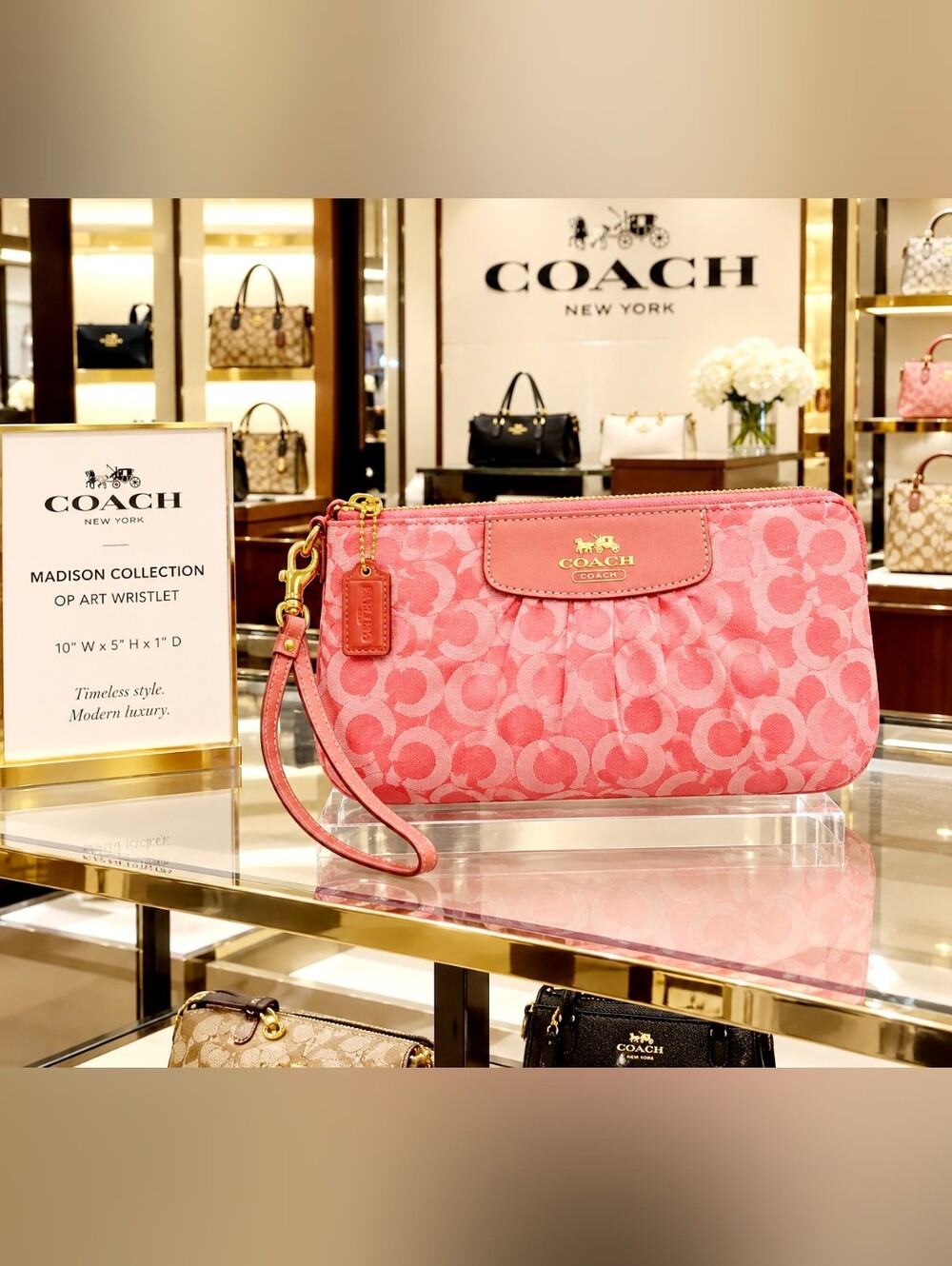 COACH Pink Signature Madison Wristlet with Gold Hardware